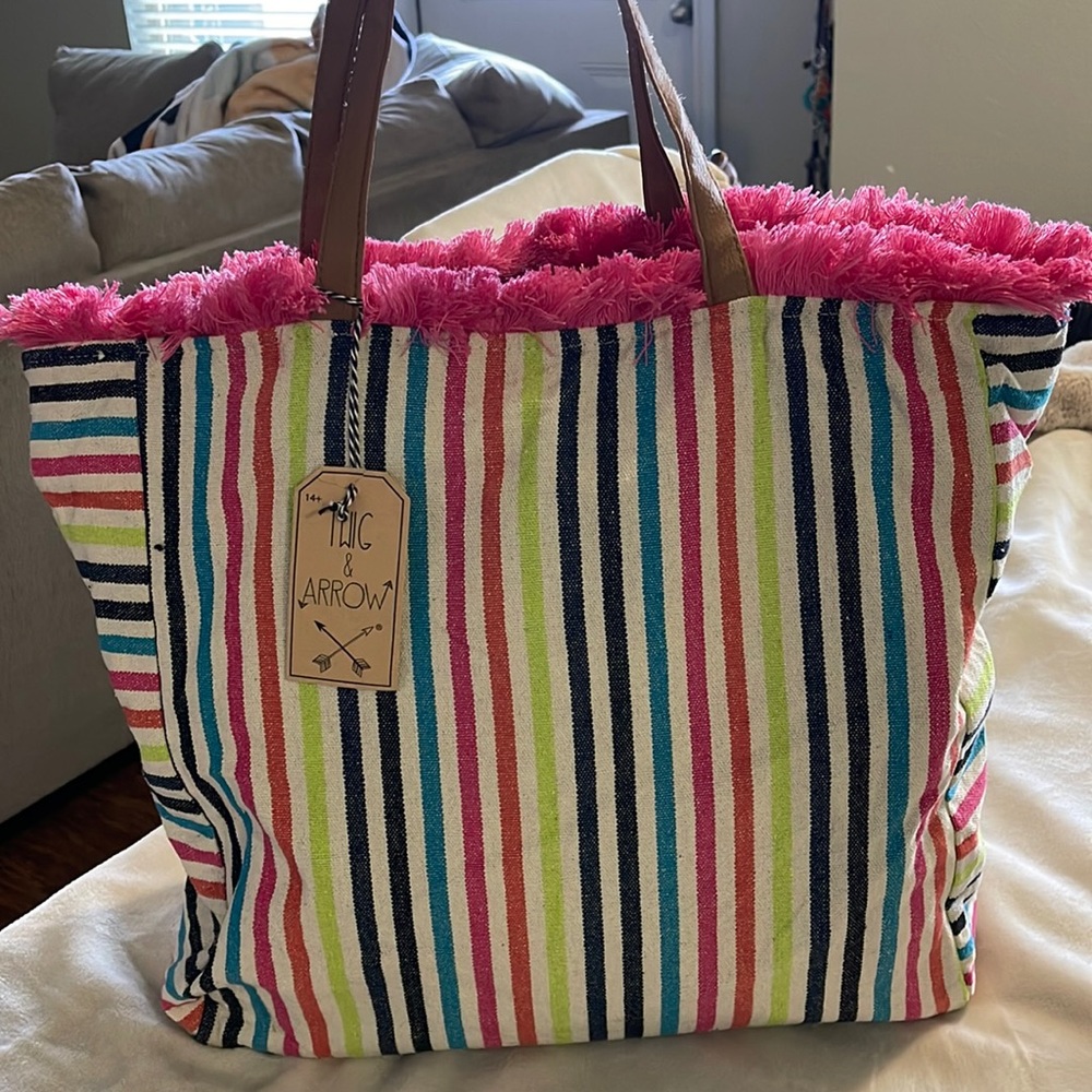 Colorful tote with pink fringe